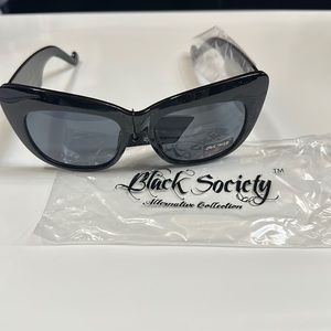 NWT Black Sunglasses with Skulls on Each Side